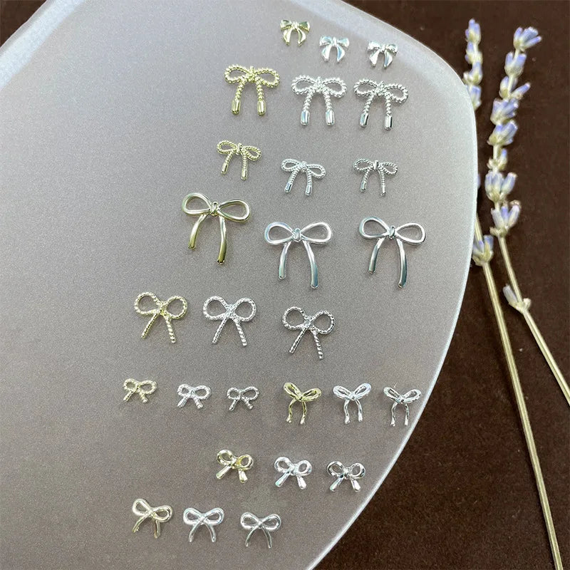 50PCS Japan Various Size Simple Thin Bowknot Bow Tie Gold Silver Twisted Alloy Nail Art Rhinestones Decorations Manicure Charms